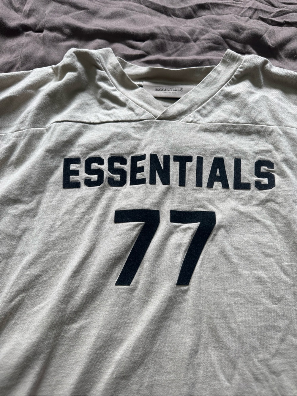 ESSENTIALS '77' Logo V-Neck Shirt